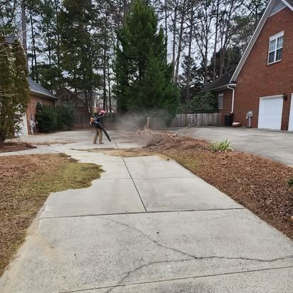 Epic Tree Trim crew completing job-site cleanup
