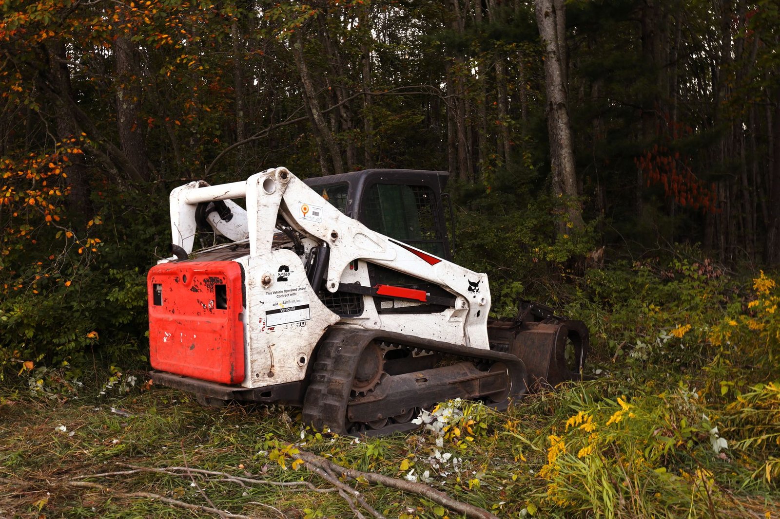 Land clearing equipment clearing brush and trees on a build-ready lot near Fayetteville, NC